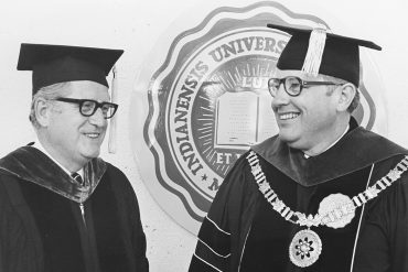 Otis Bown in his graduation attire with IU President John Ryan in May of 1976.