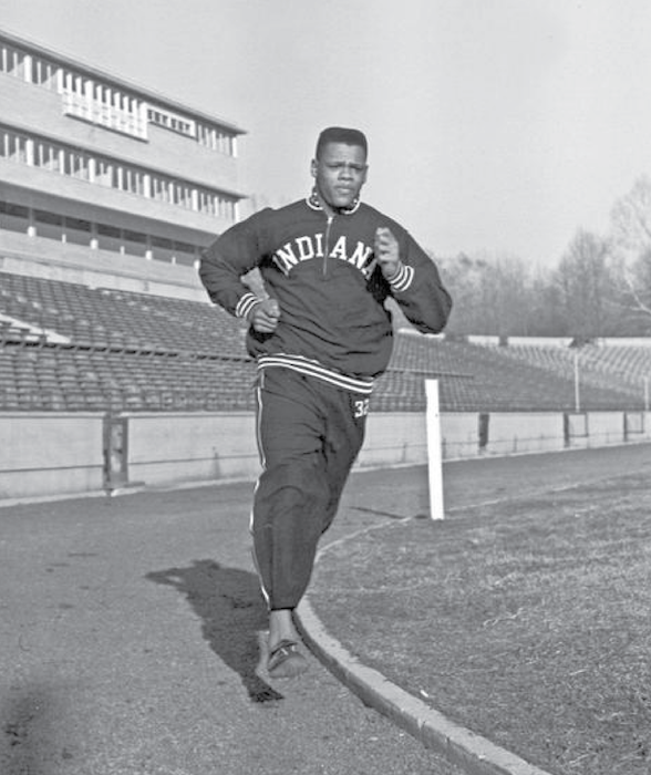 Milton Campbell running around the track at IU Bloomington 
